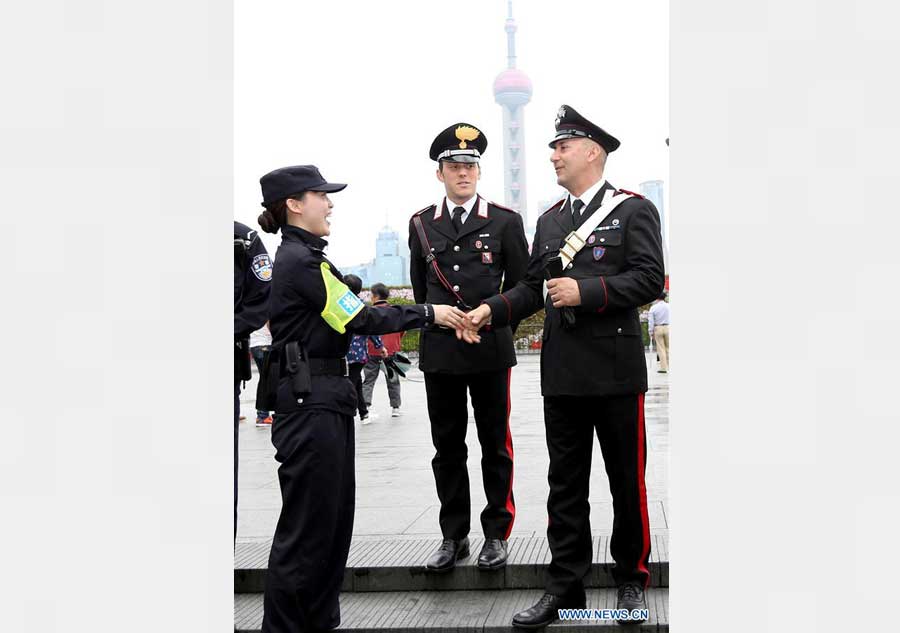 Chinese, Italian policemen patrol together in China's Shanghai