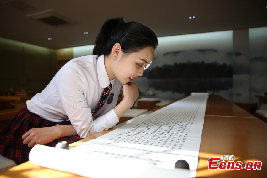 Girl hand-writes Buddhist text as Mother's Day gift