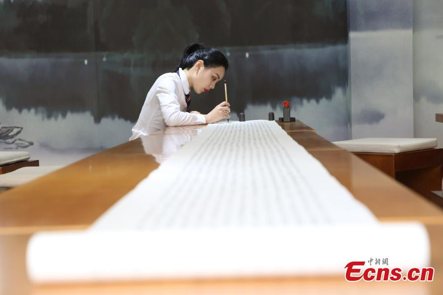 Girl hand-writes Buddhist text as Mother's Day gift