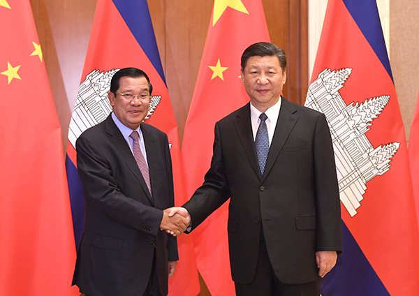 Xi meets with leaders of Argentina and Cambodia