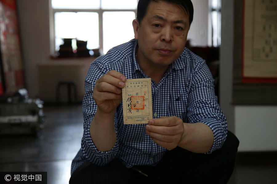 Shenyang collector gathers 200 <EM>gaokao</EM> permits