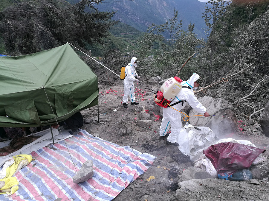 Rescue work underway after SW China's devastated landslide