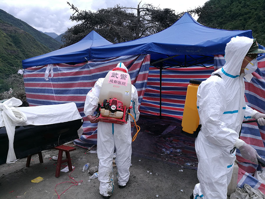 Rescue work underway after SW China's devastated landslide