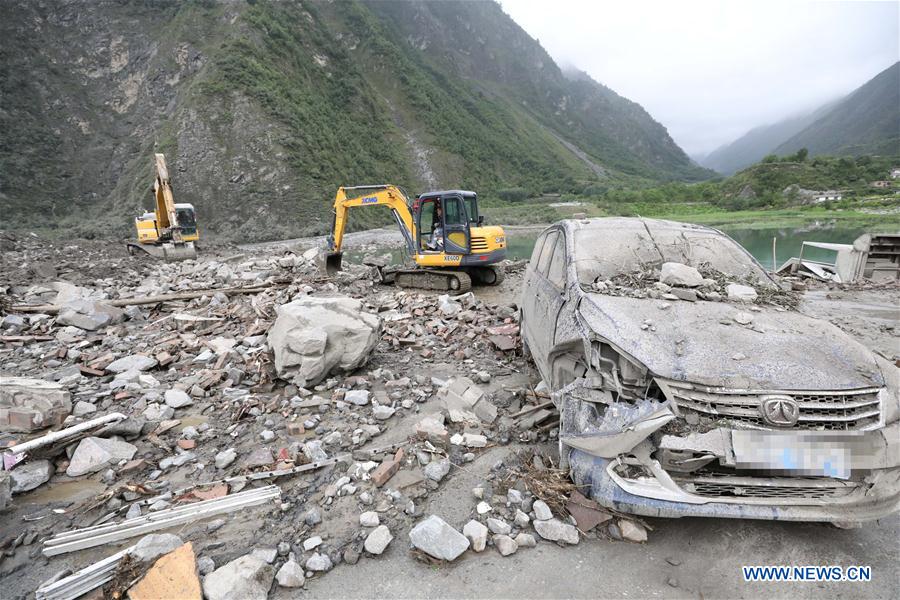 Rescue work underway after SW China's devastated landslide