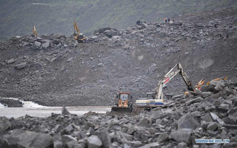 Rescue work underway after SW China's devastated landslide