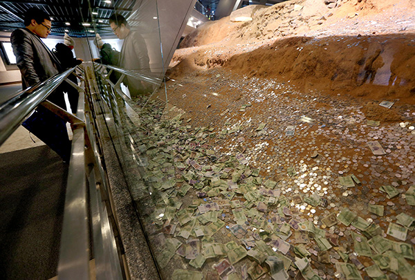 Money woes: Relics buried beneath blankets of cash