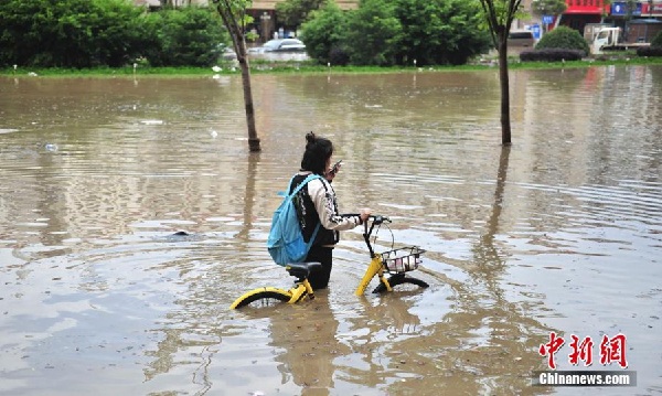 Heavy rains submerge Kunming