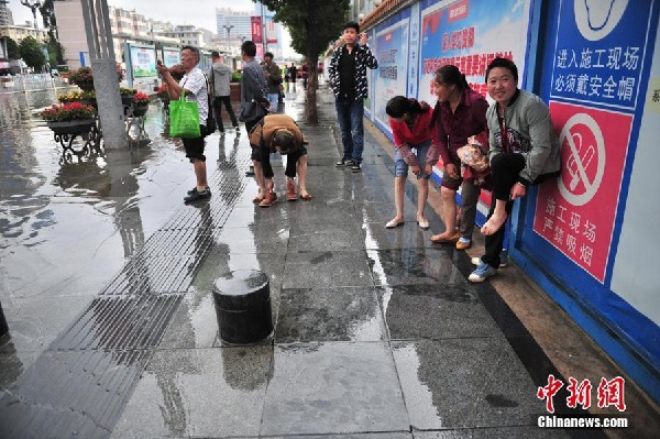 Heavy rains submerge Kunming