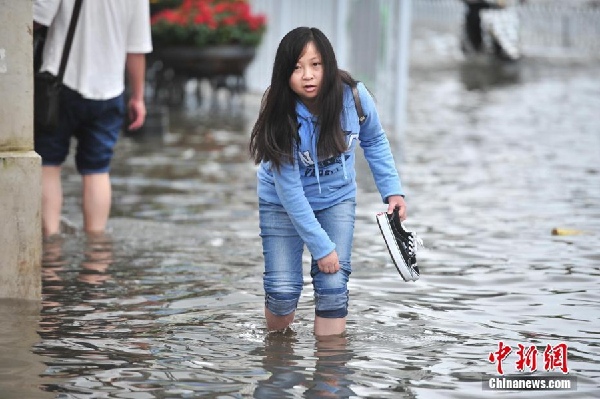 Heavy rains submerge Kunming