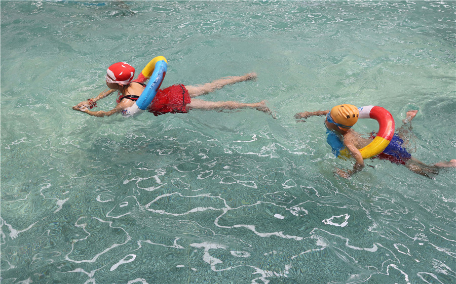 Kicking and sailing: Children learn new skills