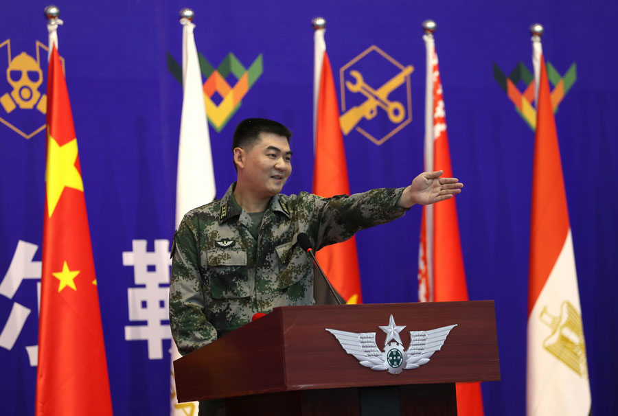 PLA soldiers prepare to do battle in the sports arena