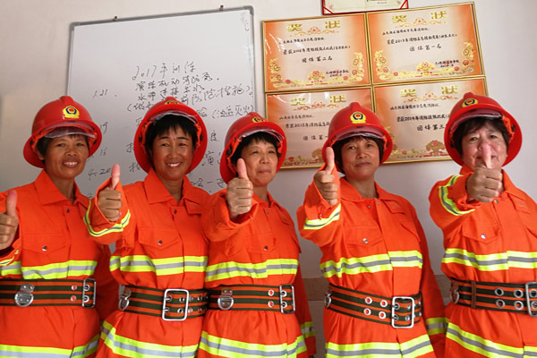 Women man the fire brigade in remote East China village