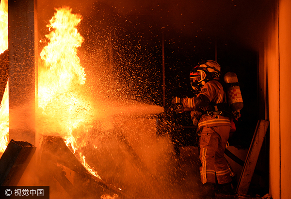 Beijing enlists professional firefighters for first time