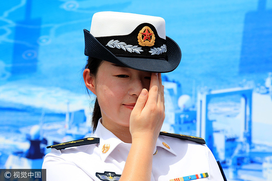 Navy sailors tie knot in middle of sea