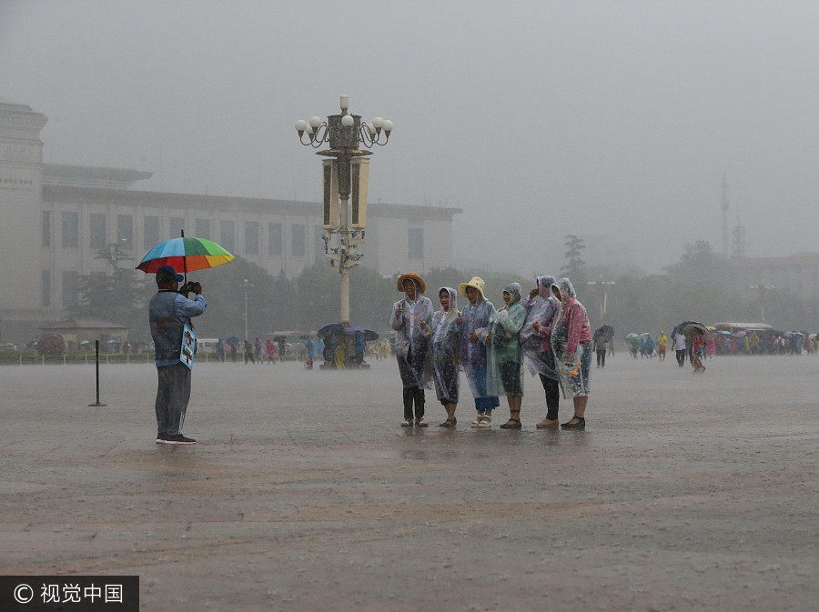 Love for Beijing despite rainstorm