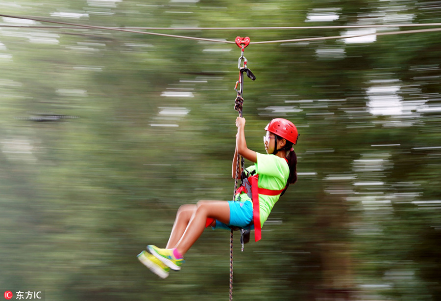 Children test survival skills in woods and on water