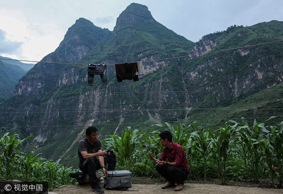 Photographer's work changes life of 'cliff village'