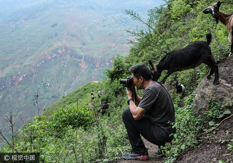 Photographer's work changes life of 'cliff village'