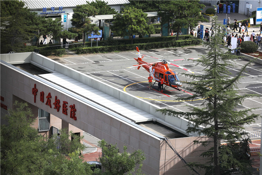 Beijing hospital opens biggest parking space and launches helicopter service