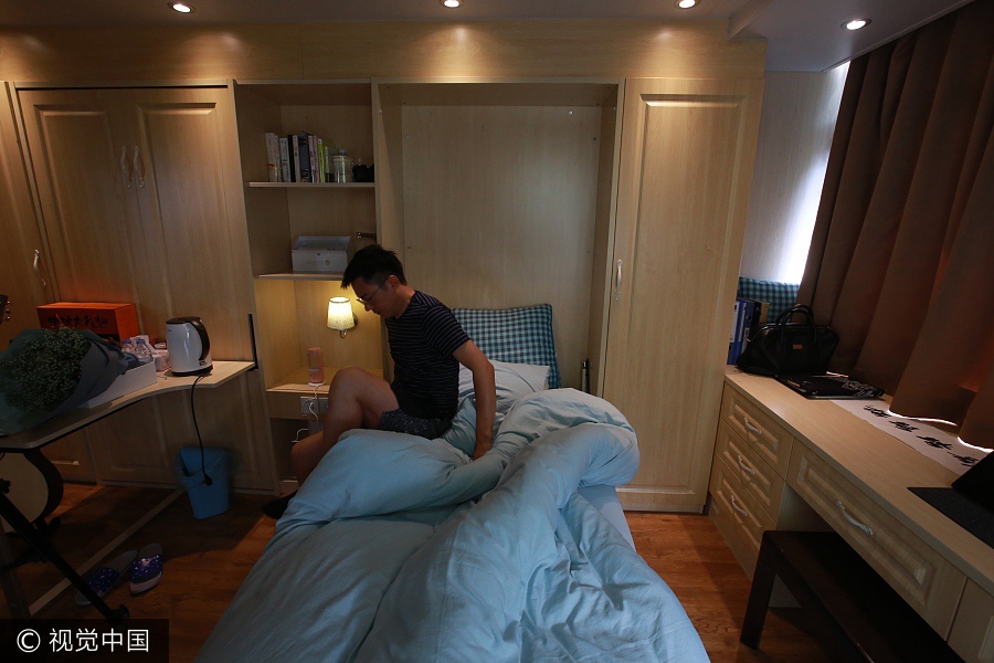 Businessman makes home in container