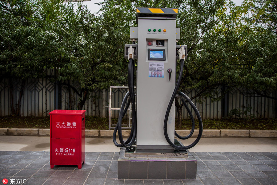 10 electric 'Chinese red' buses hit the roads in central Beijing