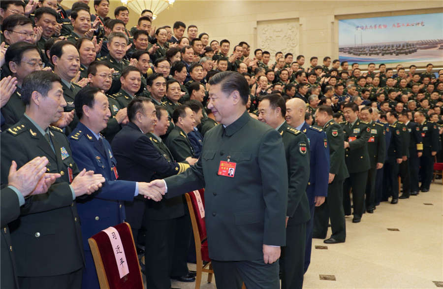 Xi meets top-ranking military officers