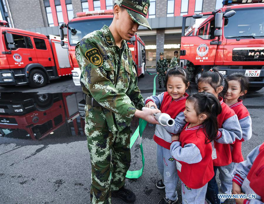 Children attend fire-fighting educational activity in E China