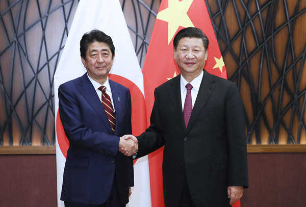 Xi urges Abe to take more practical actions to improve China-Japan ties