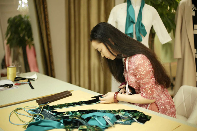 'Cheongsam Queen' earns millions as dressmaker