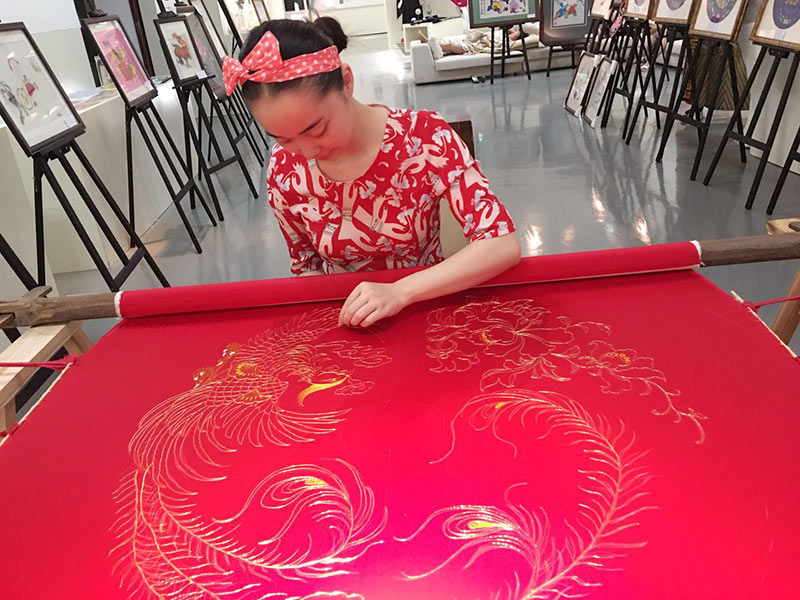 'Cheongsam Queen' earns millions as dressmaker