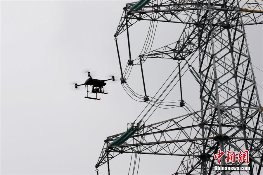 Robot, drone patrol high-voltage substation in Chongqing