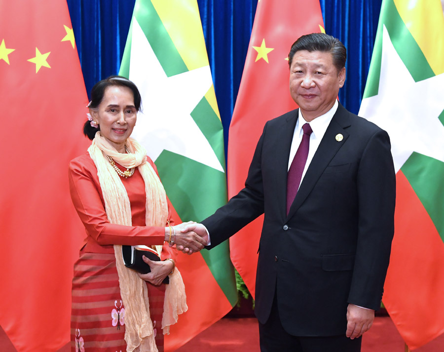 Xi meets Aung San Suu Kyi, calls for more party-to-party cooperation