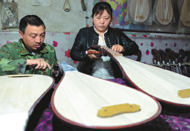 Henan farmers strike a prosperous note with pipa