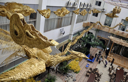 Villiagers create 30m hand-woven straw dragons, phoenixes