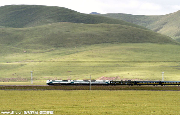 What has the Qinghai-Tibet Railway contributed to Tibet?