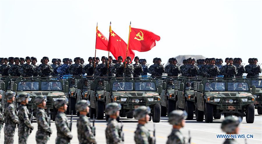 Xi inspects troops as China's military might on show