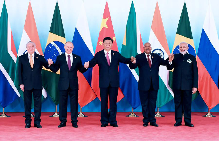 Leaders of BRICS countries pose for group photo before summit