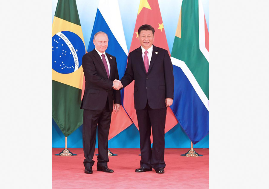 Leaders of BRICS countries pose for group photo before summit