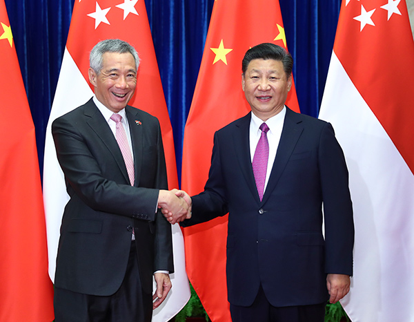 Xi meets Singaporean PM on advancing ties