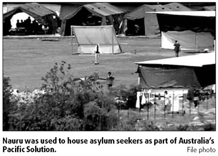 Australia dumps detention for all asylum seekers