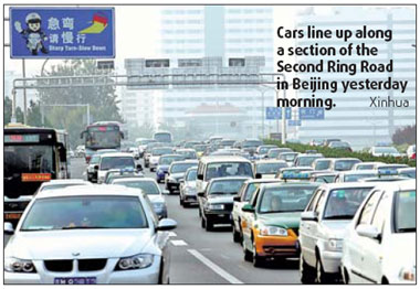Traffic eases on car ban's first day