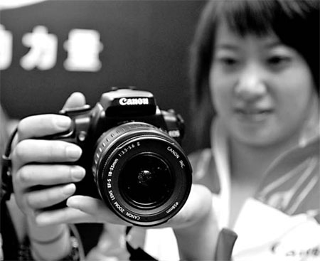 Canon relying on nation to get its flash back, says Yoshioka