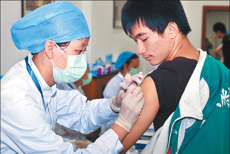 Students world's first to get H1N1 vaccine