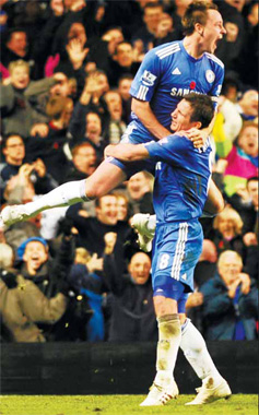 Chelsea open gap over rivals but long road ahead