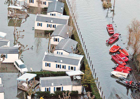 Sarkozy seeks answers over French flood damage