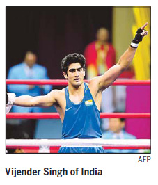 'Indian Beckham' Vijender cruises to gold