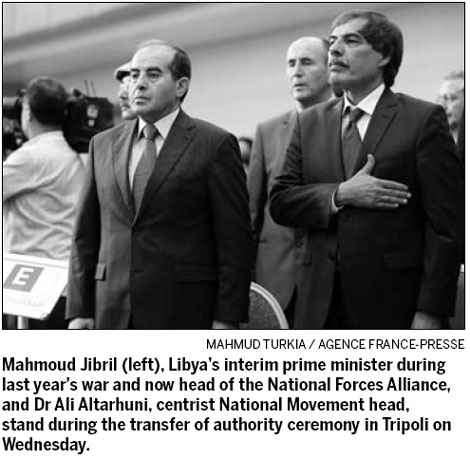 Libya's ruling council hands over power