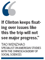 Clinton flies in amid tension