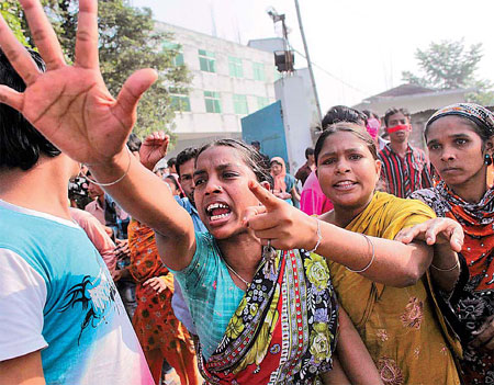 Workers protest after deadly fire