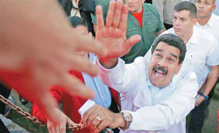 Maduro seeks peace talks
